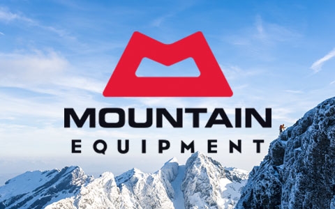 Rocks and snow with the Mountain Equipment brand logo in the middle.
