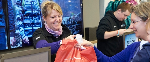 Two men next to the first Cotswold Outdoor shop